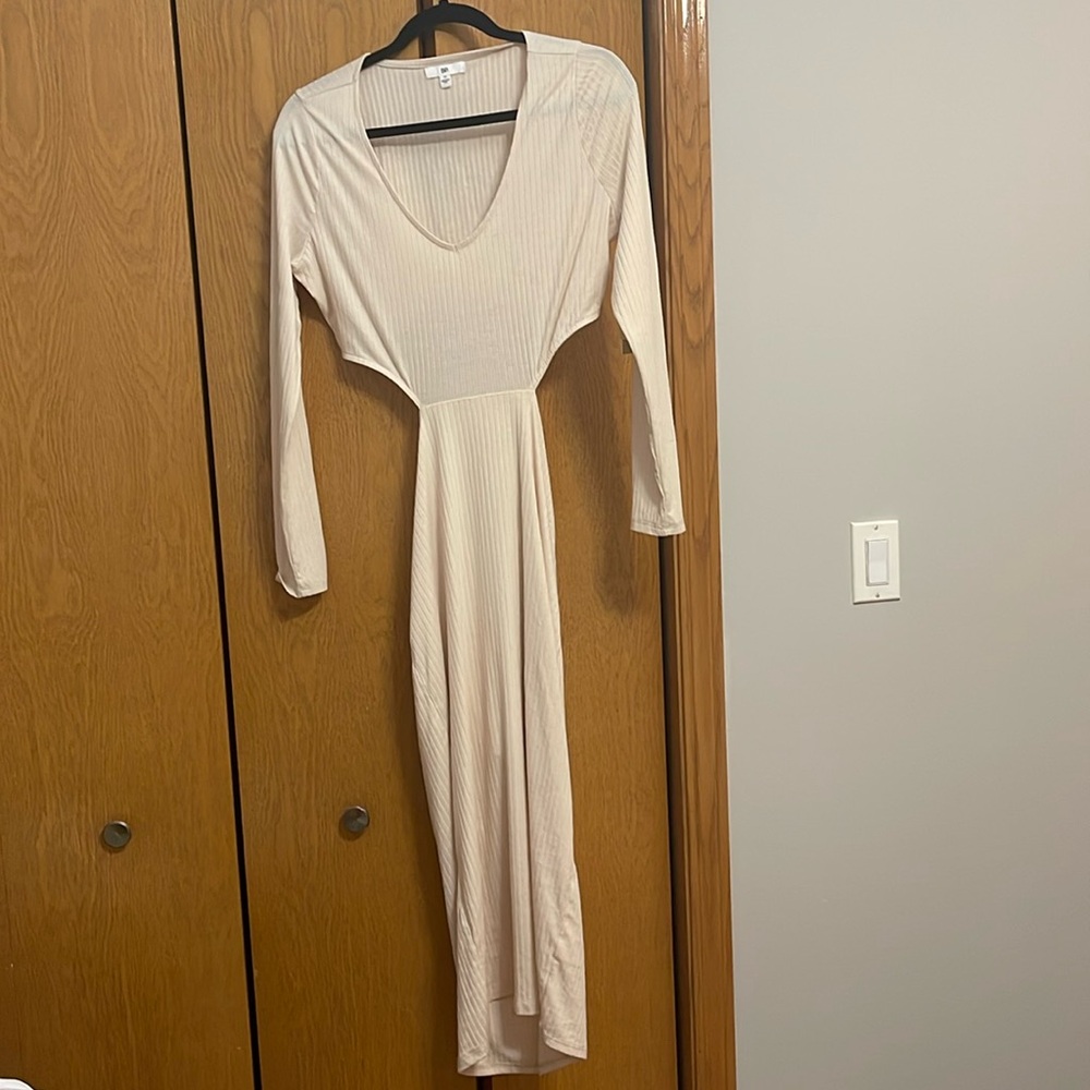 Lightweight, side cut out, maxi dress. Never worn.